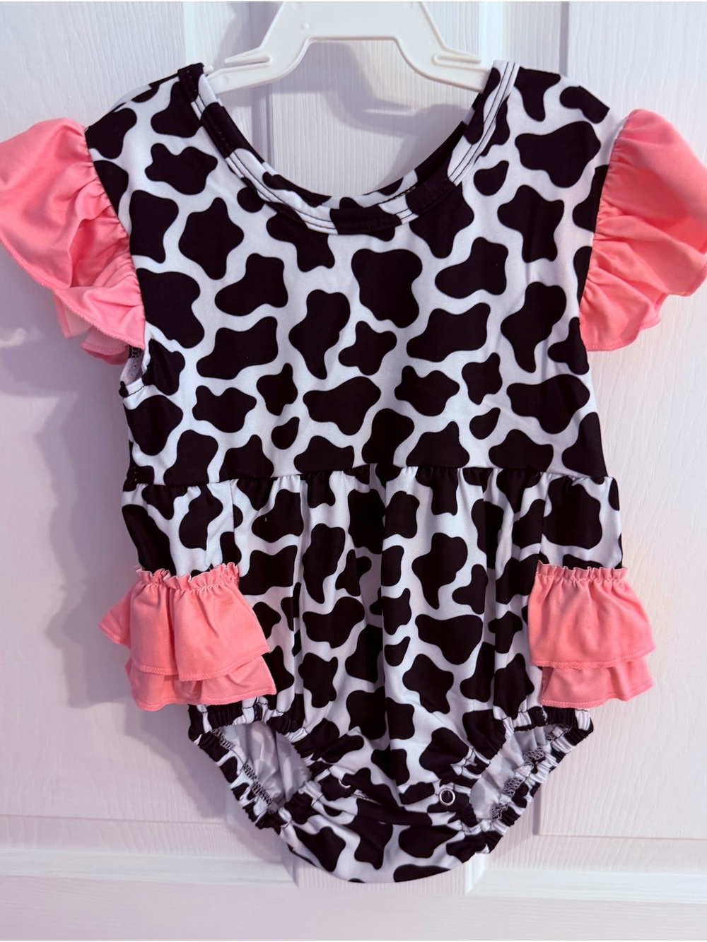 Girls Cow-Print One-Piece Swimsuit with Pink Ruffles